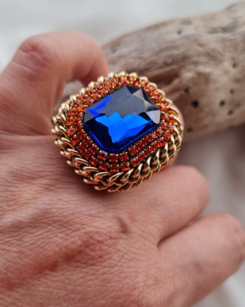 Anello regolabile azzurro e arancione