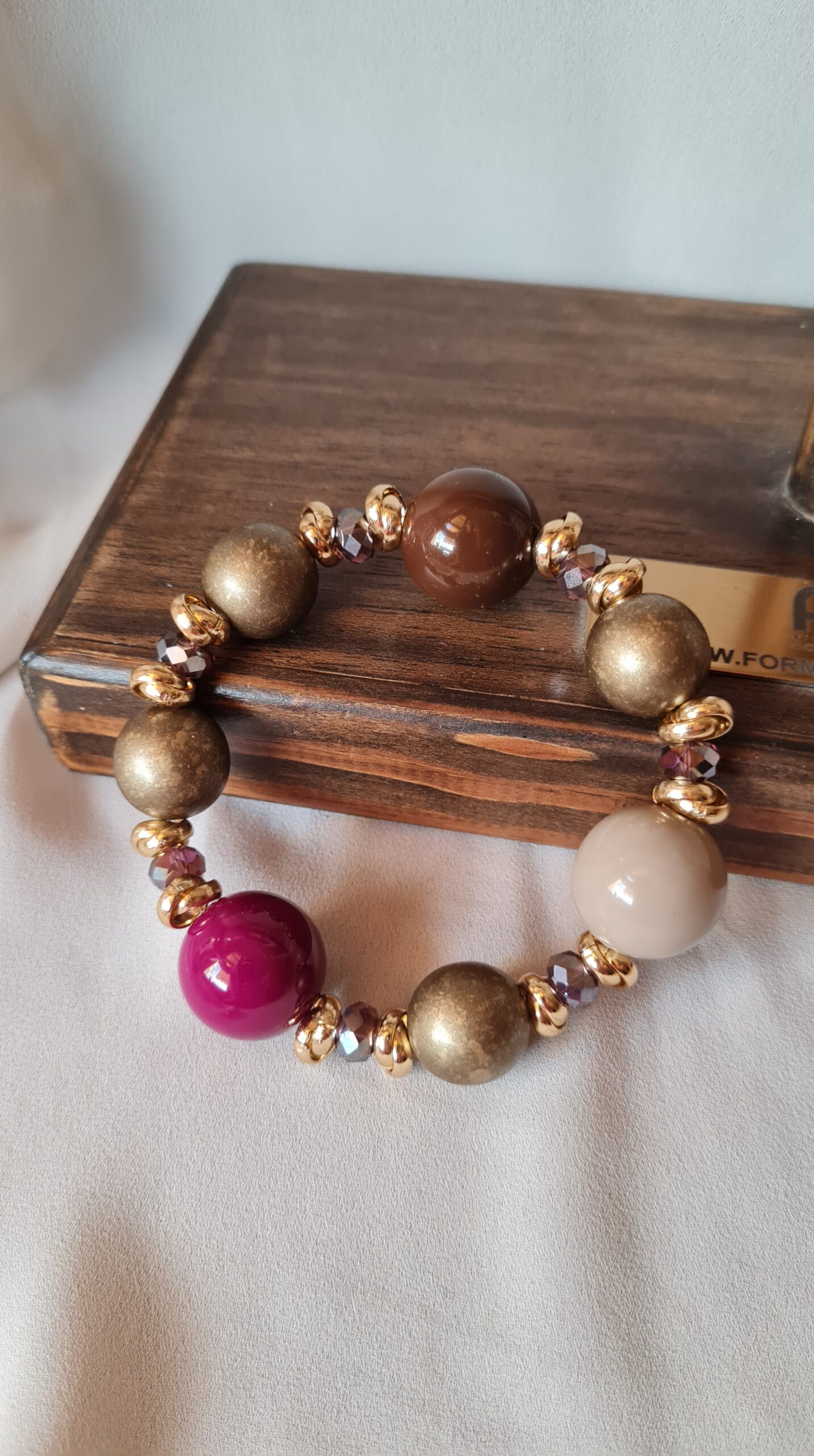 Bracciale elastico Tecla marrone e ciclamino